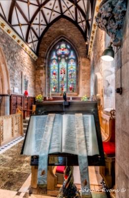 ancient welsh church with open bible